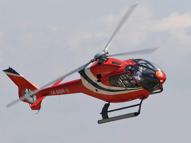 Red helicopter cloudy sky propeller free wallpaper - medium preview image