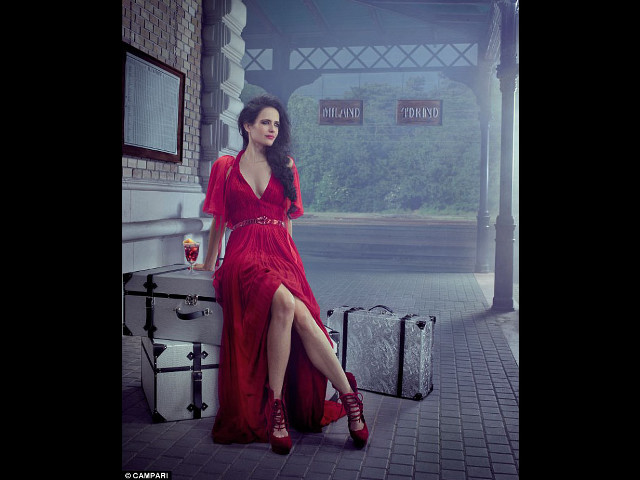 Woman red dress sitting suitcase free wallpaper - medium preview image