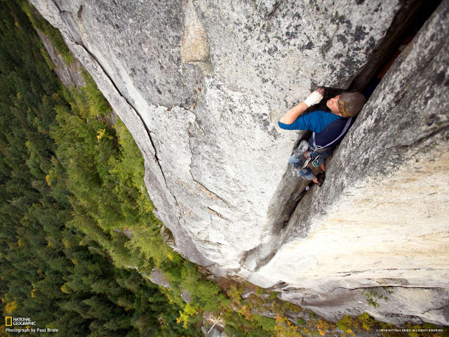 Man climbing cliff backpack superflat free wallpaper - medium preview image