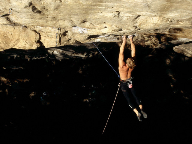 Man climbing mountain rope harness free wallpaper - medium preview image