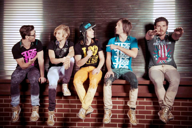 Group people brick wall bench free wallpaper - medium preview image