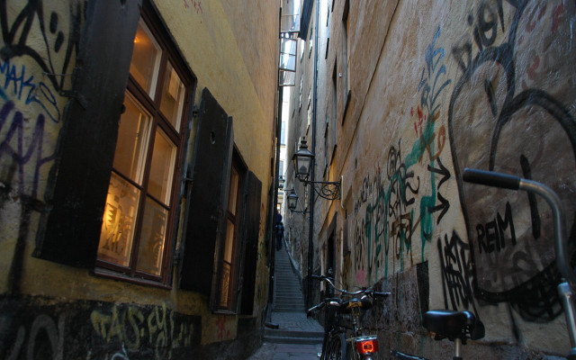 Narrow alley graffiti bicycle parked free wallpaper - medium preview image