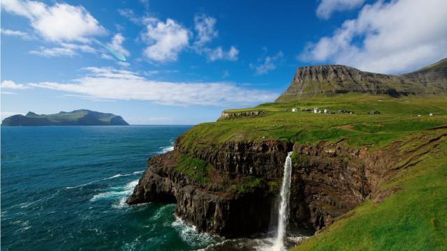 Waterfall ocean cliff grassy landscape free wallpaper - medium preview image