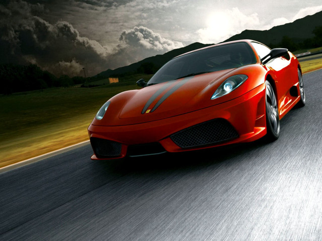 Red sports car driving cloudy free wallpaper - medium preview image