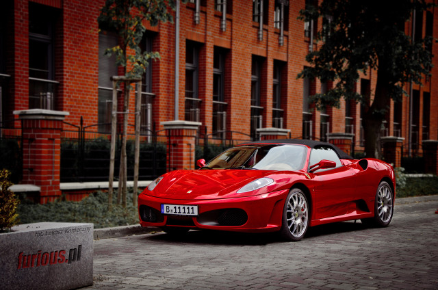 Red sports car brick street free wallpaper - medium preview image