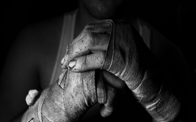 Man holding cloth bandage wrist #2 free wallpaper - medium preview image