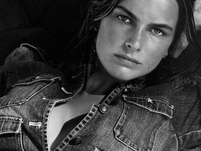 Woman jean jacket ponytail earrings free wallpaper - medium preview image