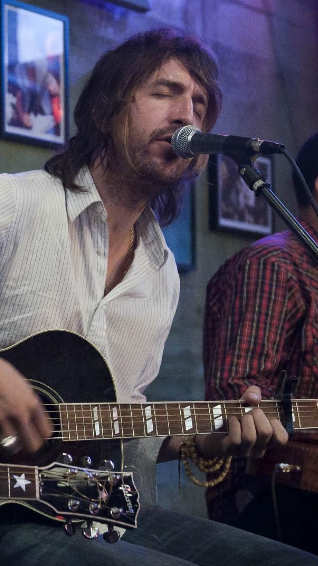 Man playing guitar singing microphone #5 free wallpaper - medium preview image