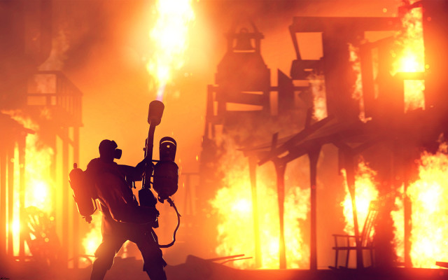 Man backpack camera fire factory free wallpaper - medium preview image