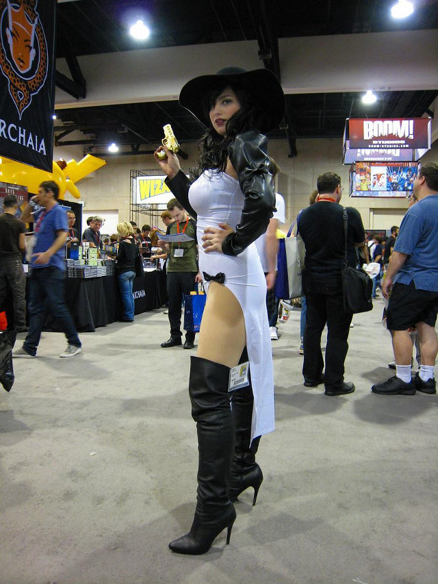 Woman costume boots convention crowd free wallpaper - medium preview image