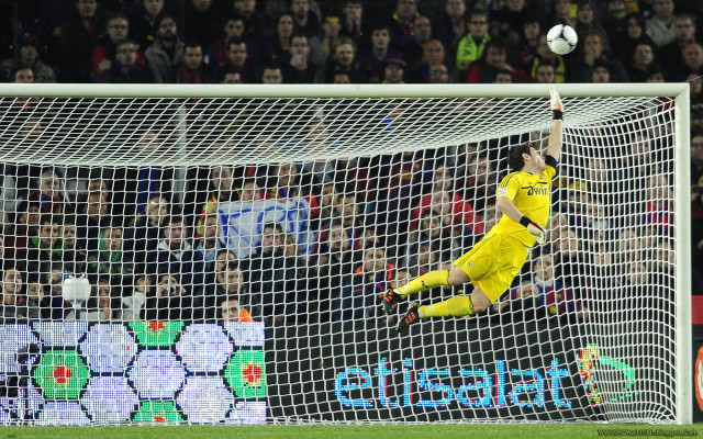 Soccer player jumping catching ball free wallpaper - medium preview image