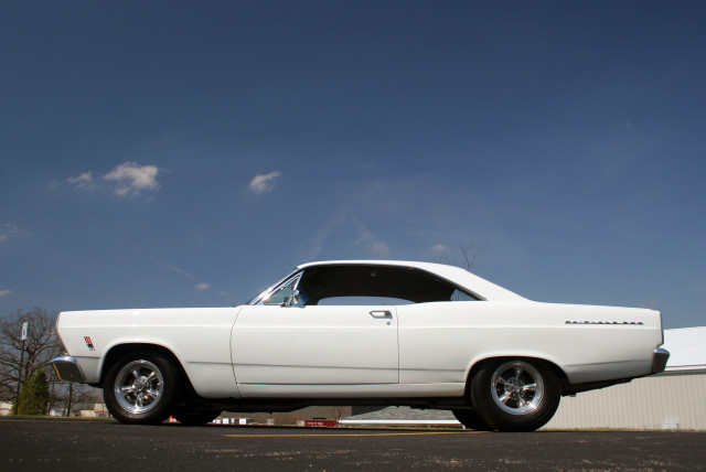 White car parking lot building #8 free wallpaper - medium preview image