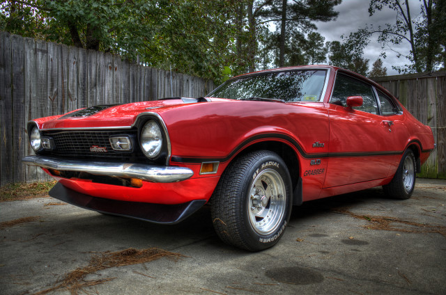 Red car parked driveway wooden free wallpaper - medium preview image