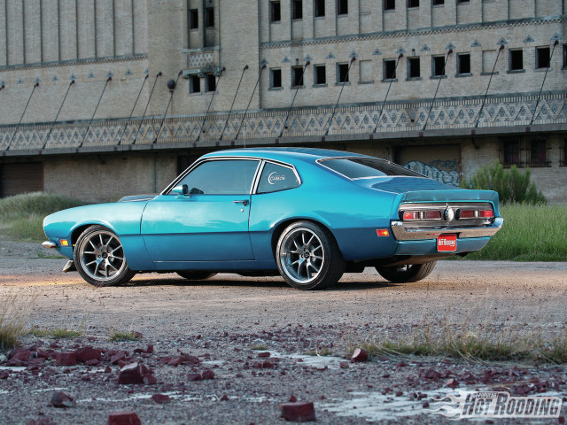 Blue car parked clock tower free wallpaper - medium preview image