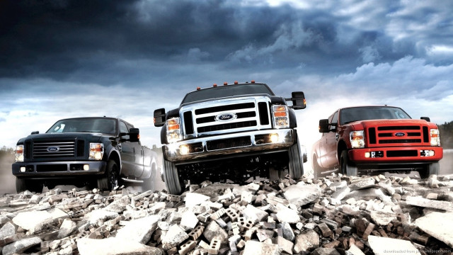 Trucks parked rocky road cloudy free wallpaper - medium preview image