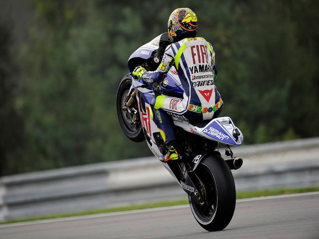 Motorcycle race track trees forest free wallpaper - medium preview image
