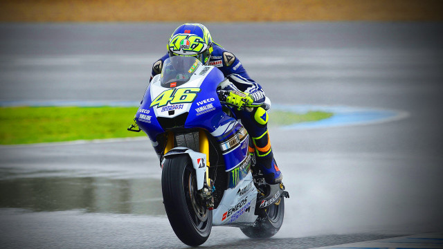 Motorcycle rider wet track helmet free wallpaper - medium preview image
