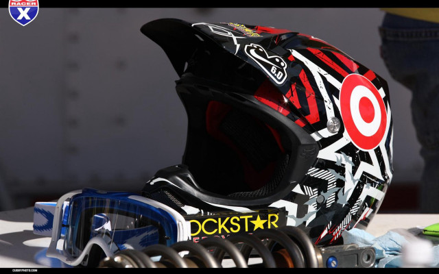 Helmet goggles table person standing free wallpaper - medium preview image