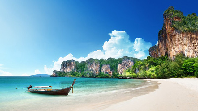 Boat beach water mountains background free wallpaper for desktop - medium preview image