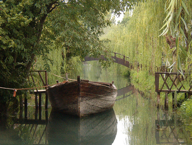 Boat docked river bridge trees free wallpaper - medium preview image