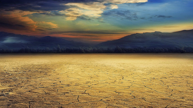 Desert sky clouds trees foreground free wallpaper - medium preview image