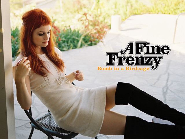 Woman sitting chair pen writing free wallpaper - medium preview image