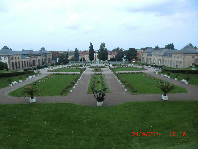 Large garden plants building clock free wallpaper - medium preview image