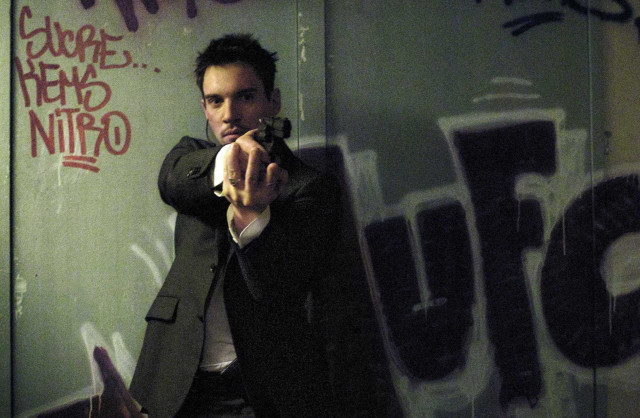 Man pointing gun camera graffiti free wallpaper - medium preview image