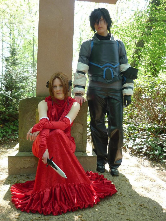 Woman red dress man costume free wallpaper - medium preview image