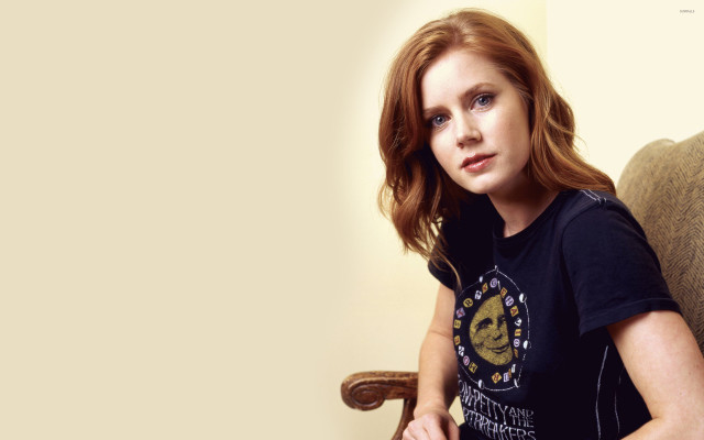 Woman sitting couch remote control free wallpaper - medium preview image