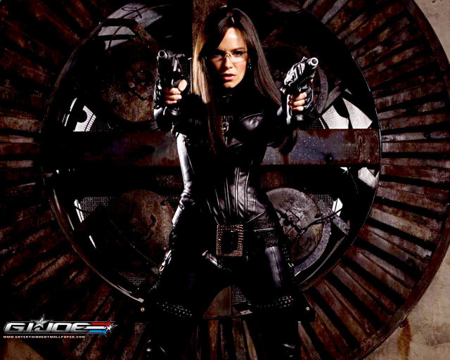Woman leather guns clock face free wallpaper - medium preview image