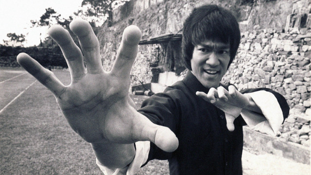 Man hand stone wall tennis free wallpaper - medium preview image