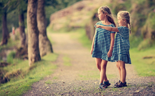Two girls standing road woods free wallpaper - medium preview image