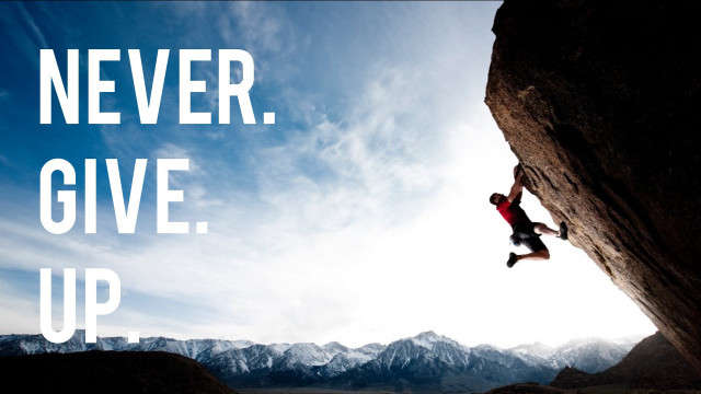 Man climbing mountain never give free wallpaper - medium preview image