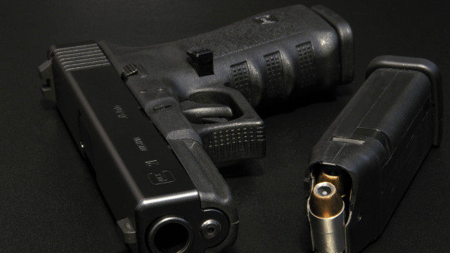 Gun lighter black surface foreground free wallpaper - medium preview image