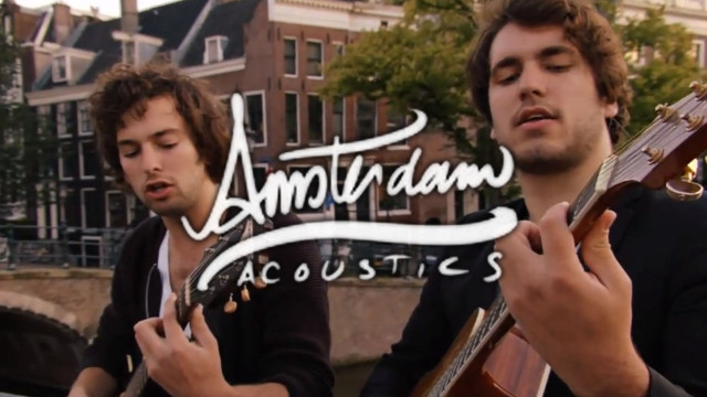 Two men playing guitars amantaan free wallpaper - medium preview image