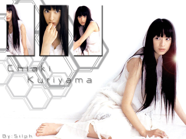 Woman black hair bangs bed free wallpaper - medium preview image
