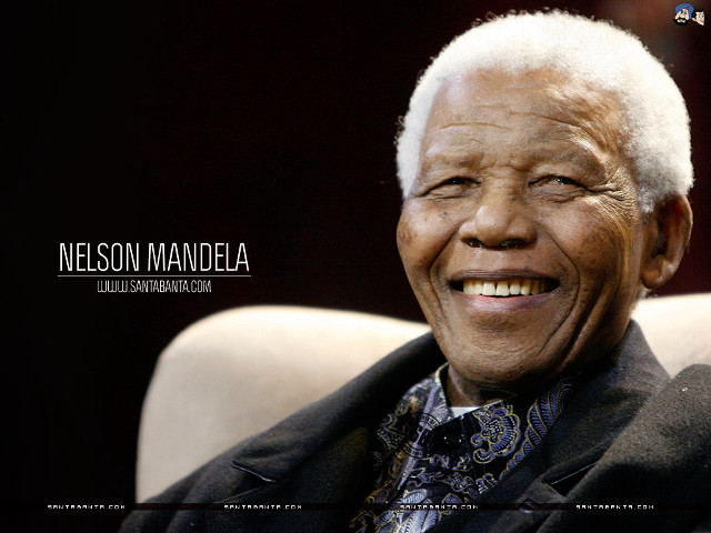 Man smiling chair black background free wallpaper - medium preview image