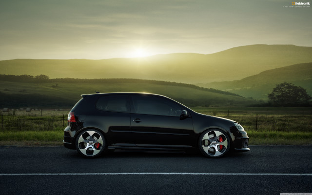 Black car parked road grass free wallpaper for desktop - medium preview image