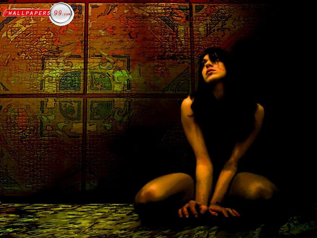 Woman sitting floor dark room #3 free wallpaper - medium preview image