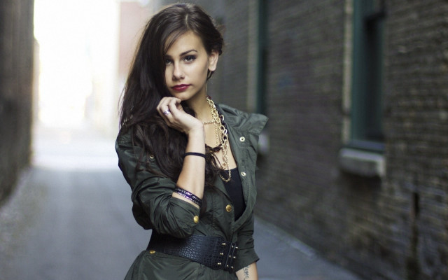 Woman standing alley way hand free wallpaper - medium preview image