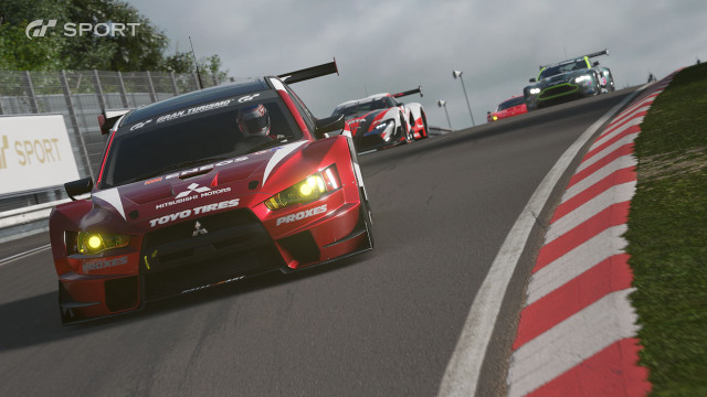 Red car race track cloudy free wallpaper - medium preview image