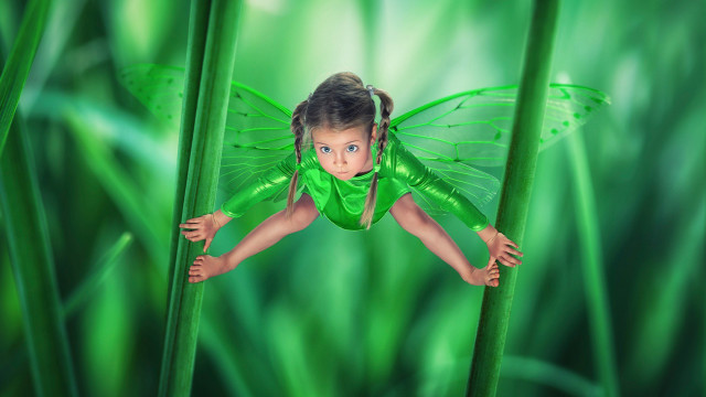 Little girl green plant background free wallpaper - medium preview image