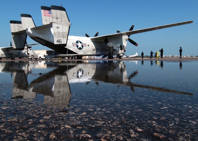 Plane parked water people standing free wallpaper - medium preview image