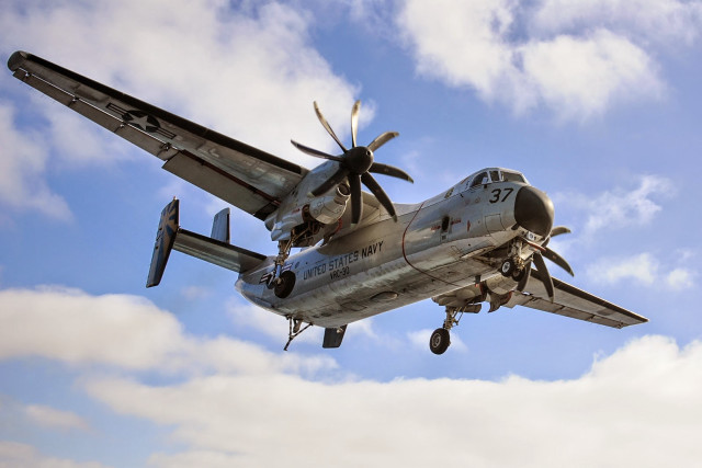 Propeller plane flying cloudy blue free wallpaper - medium preview image