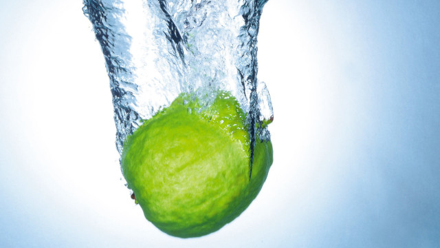 Green apple water splash dropping free wallpaper - medium preview image