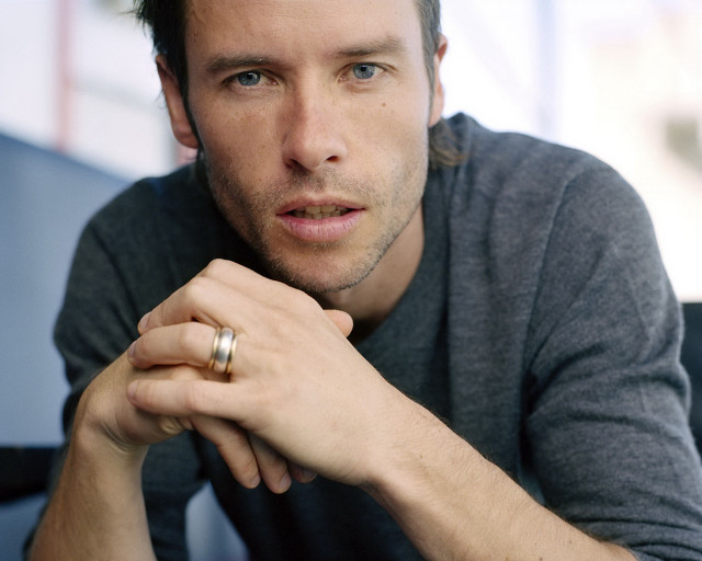 Man ring sitting hand chin free wallpaper - medium preview image