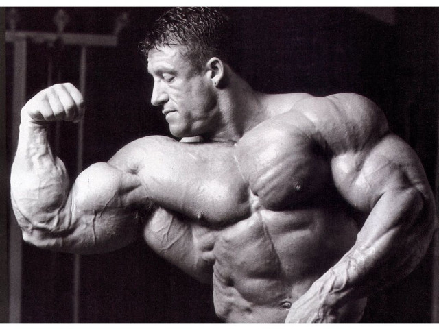 Man flexing muscles black white free wallpaper - medium preview image