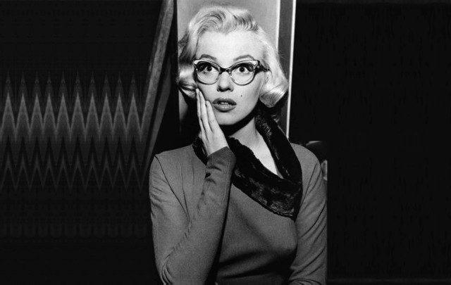 Woman glasses scarf microphone leaning free wallpaper - medium preview image