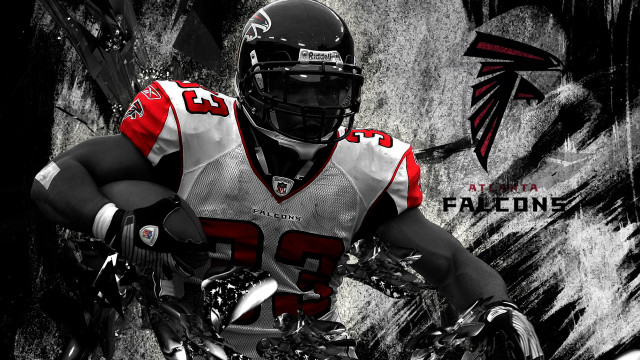Football player uniform posing picture free wallpaper - medium preview image